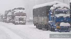 Heavy snowfall forces closure of national highway and suspension of air travel in north India
