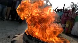 Tyres burned and police pelted with stones by protesters in Golaghat, India