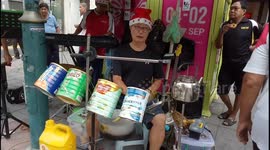 Malaysian creative street performers using recycle used items as drums instrument