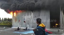 Buildings and busses set ablaze in Citizenship Act protests in India's West Bengal