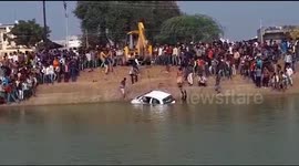 Learner driver becomes learner diver in India after accelerating into pond during lesson