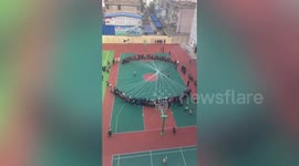 Students in China gather to form one massive jump rope experience