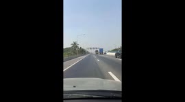 Two stubborn truck drivers refuse to let each other pass on motorway