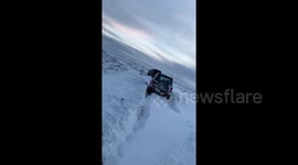 Five landrovers stuck in snow on Deadman's Hill, North Yorkshire