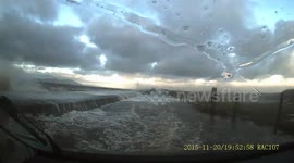 Moment UK family were nearly swept away by storm waves that engulfed their car