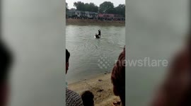 Further Footage: Learner driver becomes learner diver in India after accelerating into pond during lesson