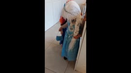 3 year old and 4 year old sisters dress up as Frozens Elsa and Anna