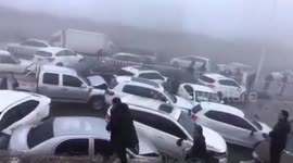 Dozens of vehicles slam into each other on icy road in northern China