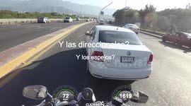 STUPID DRIVER IN THE CAR CLOSE THE WAY A MOTORCYCLE