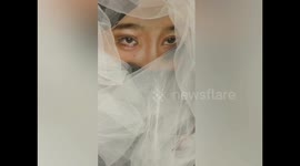 Chinese art teacher draws incredibly realistic facial features ON HER ARM