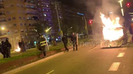 RUSHES: Riot police confronted by protesters in Barcelona