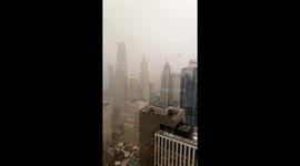 US man films timelapse of snow squall engulfing New York City from towering office block