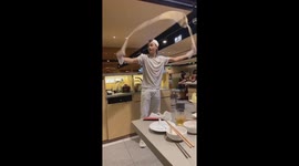 Waiters perform energetic 'noodle dance' at hot pot restaurant in Vietnam
