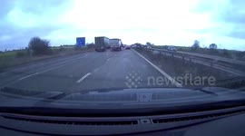 Huge sheet of ice smashes car windscreen after falling off moving lorry