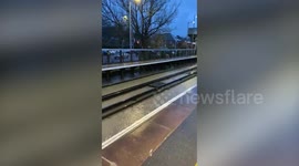Commuters left facing severe delays after heavy rainfall causes train tracks to be buried under two inches of water