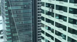 Workers Repair Hotel Window 23 Floors High