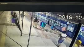 Brave cop swings into action, saves woman from getting run over by moving train in southern India
