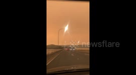 Australian bush fires turn New South Wales sky orange