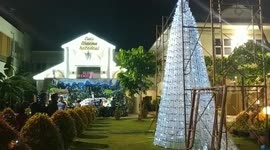 2000 bottles of 600 milli liter drinks are assembled into Christmas trees in the Santatresia Cathedral of Padang