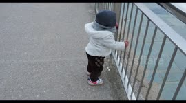 tiny little baby girl walks on her own
