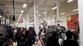 Heaving checkouts at Tesco in London as shoppers make last-minute Christmas buys