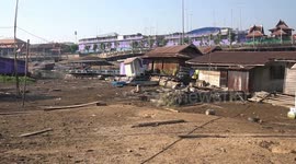 Thai river dries up leaving floating homes on riverbed