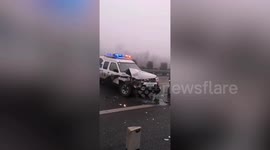 Dozens of cars left mangled in pileup on highway in northern China