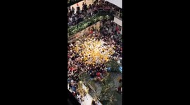 Balloon-drop triggers stampede in Sydney mall, injuring Christmas shoppers