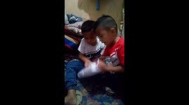 Cute moment boy receives Barbie doll gift