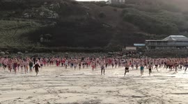 UK swimmers brave chilly temperatures as they take Christmas Day dip in Cornwall
