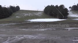 Toronto Canada had a green mild Christmas day leaving the Centennial park ski hill with no snow and weather too mild to make snow right now