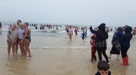 UK swimmers brave chilly temperatures as they take Boxing Day dip in Cornwall