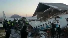 Passenger jet carrying nearly 100 people crashes in Kazakhstan's largest city killing at least 15