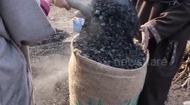 The making of charcoal  in Kashmir Northern India
