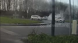 Driving instructor and public run to stop a fire in a Vauxhall Corsa