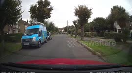 Cat runs in front of a learner car causing it to stop in emergency, cat runs off