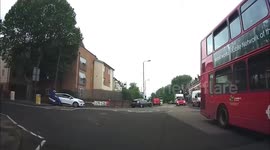 Scooter rider fails to give way to learner on mini roundabout and cuts it out the wrong way