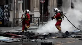 Firefighters put out blaze in central Paris after another day of protests