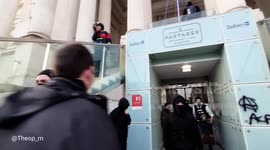 Protesters invade a square facing a hotel