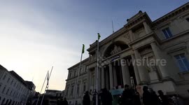 Protesters take down European flag and replace it with a yellow vest
