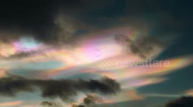 Incredibly rare sighting over northern Sweden as 'polar stratospheric cloud' shimmers in the sky
