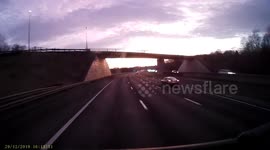 Audi and truck driver get in VERY close call on UK highway