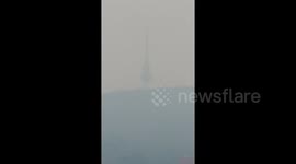 Canberra's Telstra tower shown in clear weather on news channel despite clouds of smoke in reality