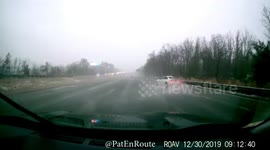 Car spins out of control on an icy road in Boston