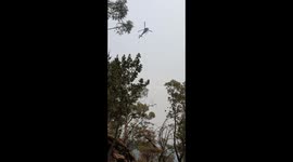 Helicopter drops water on Gospers mountain fire in Australia