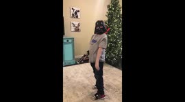 Ezra aka Mini-Vader Shows Off His Light Saber Skills