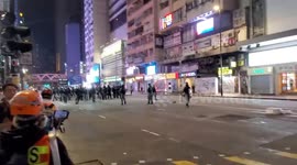 Riot police in Hong Kong raise warning flags after calling off peaceful pro democracy march on New Years day
