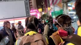 Hong Kong police arrest young protester at peaceful pro-democracy demonstration