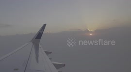 Airline passenger captures sunlight through hazy smoke in New South Wales on New Years Day 2020
