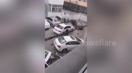 Angry man smashes car that blocks his vehicle's way for several days
